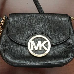 Michael Kors crossbody purse.